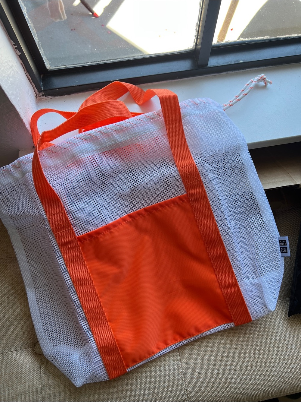 Uniqlo Orange and white beach tote bag